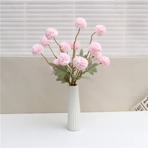 Artificial pink pompon chrysanthemum flowers in white ceramic vase home decor tabletop ornament