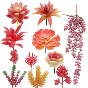 Conjunto de cabezas de flores falsas de plantas suculentas artificiales para escritorio.