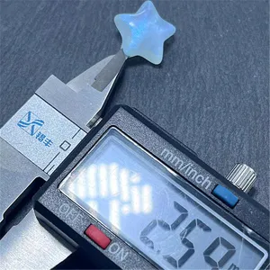 Detail shot showing the shimmering acrylic mermaid star bead measured with a digital caliper.