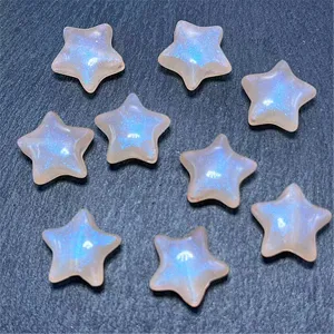 Close-up detail of mermaid acrylic star beads for DIY jewelry making and phone chain design.
