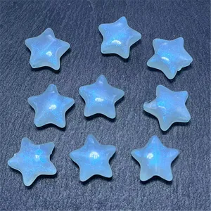 Close-up detail view of luminous acrylic mermaid star beads for DIY crafts and jewelry making.