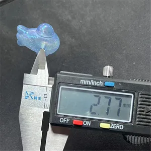 Blue iridescent airplane acrylic DIY jewelry charm accessory, precision measurement display.