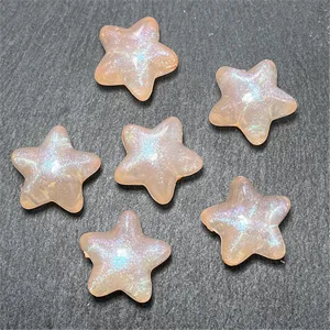Close-up detail of shiny mermaid star beads, perfect for DIY phone charms and crafts.