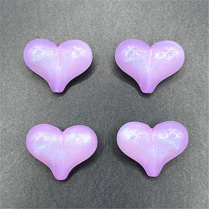 Luminous peach heart resin charms for DIY jewelry phone chain and bag craft accessories.