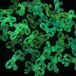 Glow in the dark bow beads with glitter, perfect for DIY jewelry making and craft accessories.