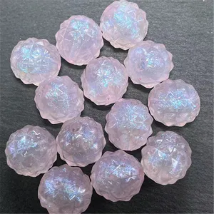 Close-up detail of acrylic mermaid luminous faceted bayberry beads for DIY craft accessories.