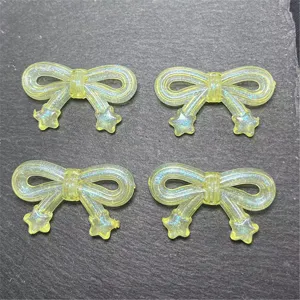 DIY resin bow star charms for handmade phone straps and craft jewelry accessories.