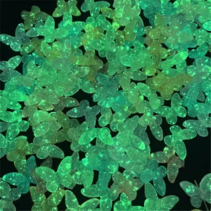 Glow in the dark butterfly DIY charms for phone chains and handmade jewelry crafting projects.