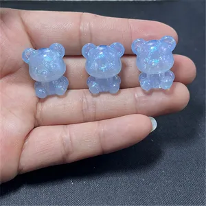 Breloques ours résine pailletée bleue pour fabrication de bijoux DIY colliers accessoires artisanaux.