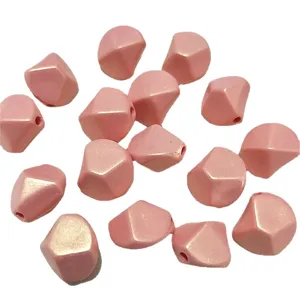 Acrylic irregular diamond loose beads in macaron pink for DIY jewelry making and bracelets.