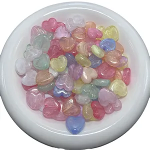 Colorful acrylic heart beads with gold powder for DIY phone chains and jewelry accessories.