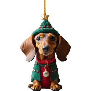 Close-up of cute dachshund Christmas tree ornament with festive hat and red sweater.