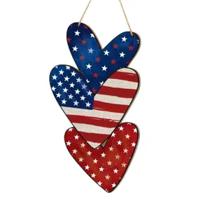 Close-up detail of the patriotic heart hanging sign with stars and stripes design.