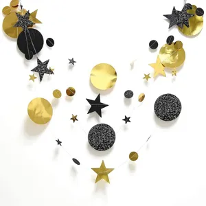 Gold and black glitter star moon paper garland hanging detail close up for bedroom room decor