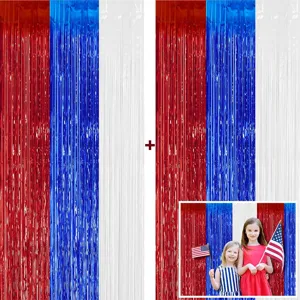 Detail view of red white and blue metallic foil fringe curtains for party decoration and photo backdrop.