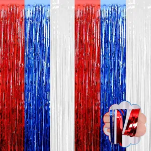 Close-up detail view of shiny metallic red, white, and blue foil fringe curtains for party decor.