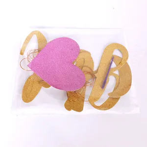 Boy or girl glitter party banner set with heart card, golden letters and string for baby shower.