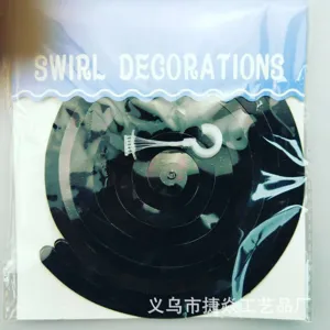 Black PVC swirl hanging decorations for party ceiling decor and celebration events.