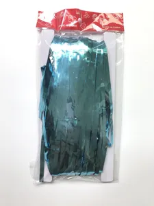 Blue metallic foil tinsel curtain detail, shimmering fringe backdrop for party decor.