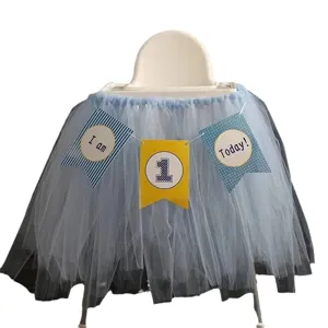 Fluffy tulle tutu high chair skirt for baby first birthday party and table decor.