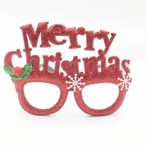 Red glitter Christmas glasses detail view, festive party eyewear close-up product photo.
