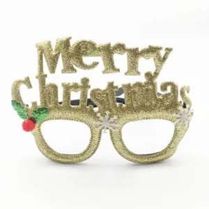 Christmas decorative glasses detail, gold glitter holiday party prop and festive accessory.