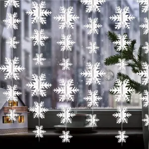 3D white hanging snowflake string decorations for Christmas, New Year, and winter window.