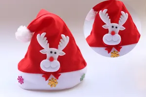Detailed view of the Christmas hat featuring cute plush reindeer face and colorful snowflakes.