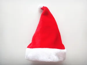 Classic red and white plush Santa hat, perfect for Christmas holiday parties and festive dress up.