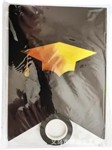 Graduation season party decoration banner with black swallowtail flags and gold foil cap.