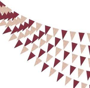 Glitter triangle bunting banner for party decoration, hanging garland close-up detail view.