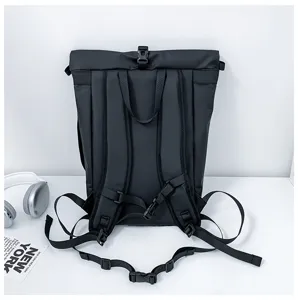 Black roll-top backpack detail shot, showing adjustable straps and large capacity for commute.