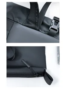 Detailed view of black waterproof backpack showing adjustable mesh straps, buckle and zipper.