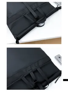 Close up view of the black minimalist backpack top closure, durable straps, and secure buckle details.