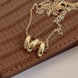 Chunky gold plated irregular wave pendant necklace, fashion geometric brass jewelry detail
