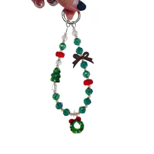 Christmas beaded phone charm lanyard with tree and wreath pendants, cute bag accessory.