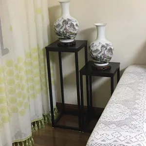 Modern black iron plant stand indoor balcony flower pot holder rack for home decoration display.