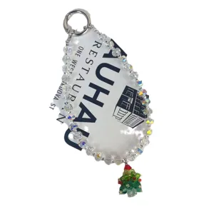Crystal beaded phone charm with Christmas tree pendant, sparkling crystal bag charm accessory.