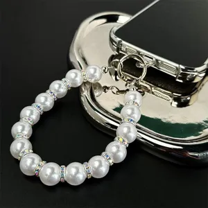 Handmade pearl phone charm strap elegant white beaded wrist lanyard for phone case accessories
