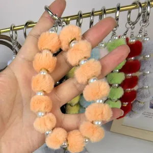 Fluffy pom pom pearl wristlet strap keychain for phone bag charm accessory details view