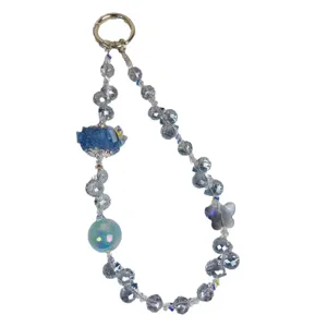 Crystal beaded phone chain and bag charm with faceted blue beads and cute butterfly pendant.