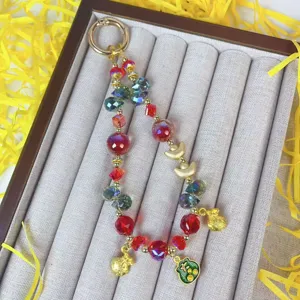 New Year crystal beaded phone charm cute alloy lucky bag gold ingot bag keychain pendant