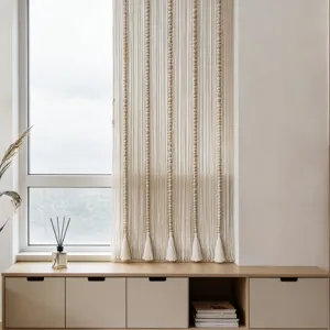 Nordic handmade woven string curtain with wooden beads and tassels for room divider and bay window.