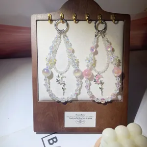 Exquisite crystal beaded phone chain charm with cute fairy and moon pendant ins style.