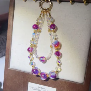 Handcrafted double layer beaded phone charm pendant with gilt beads and crystals for women.
