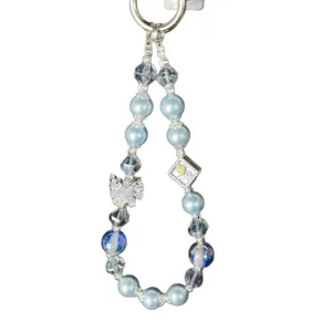 Luxury crystal beaded phone charm with blue pearls and bow zircon pendant for wrist.