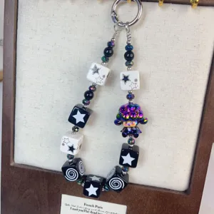Sweet and cool phone lanyard with cute cartoon sheep pendant and black white square beads.