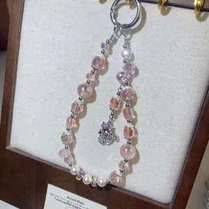 Pink crystal phone charm beaded wrist strap short cute phone case pendant accessories.