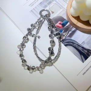 Lanière de téléphone en perles de cristal gris fait main avec nœud élégant