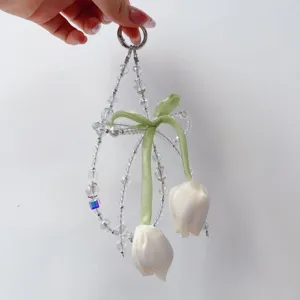 Handmade tulip beaded phone charm and cute bag pendant with crystal beads and green ribbon.